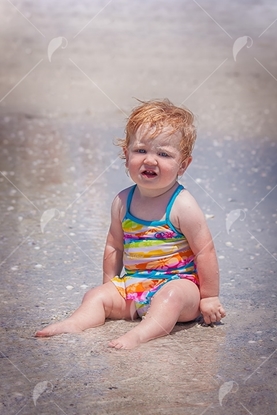 Picture of Baby Girl In Water on beach