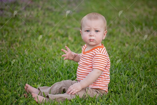 Picture of Baby Boy Sitting in Grass