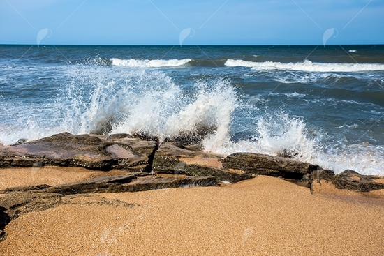 Picture of Waves Splashing Rocks